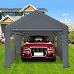 Carport canopy sheltering a red SUV in a grassy yard setting